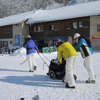 rolstoel sneeuw ski